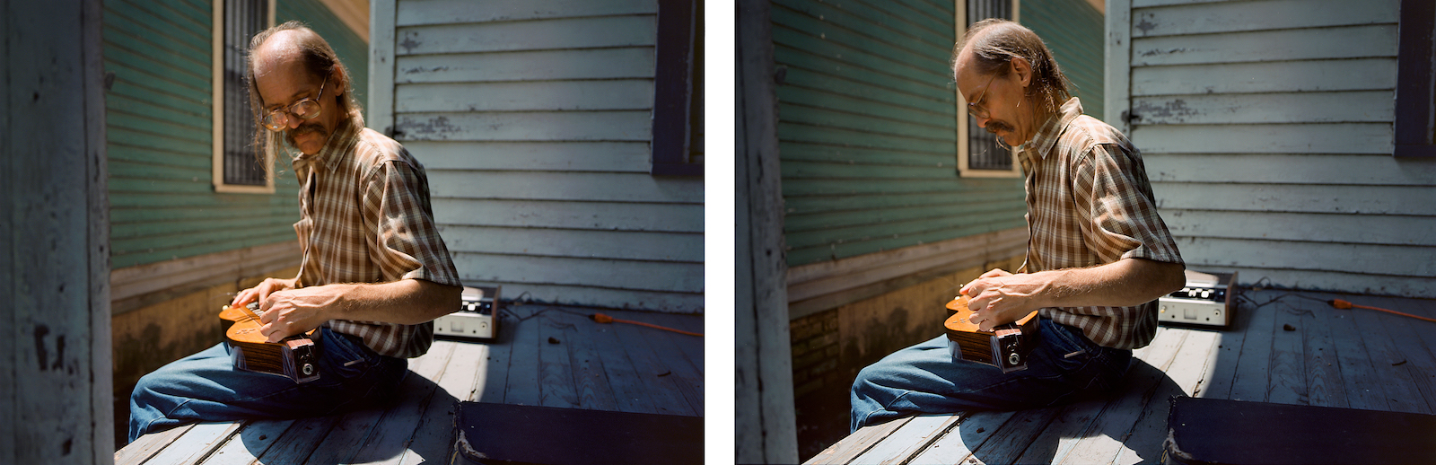 Dulcimer player in front of a shotgun house, 2010